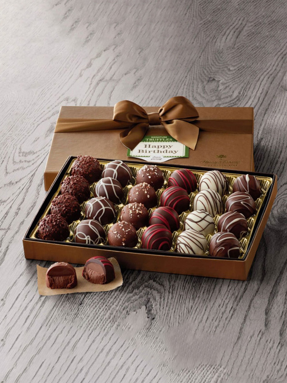 Personalised truffle packaging boxes with inserts made from premium cardboard for secure storage and elegant presentation