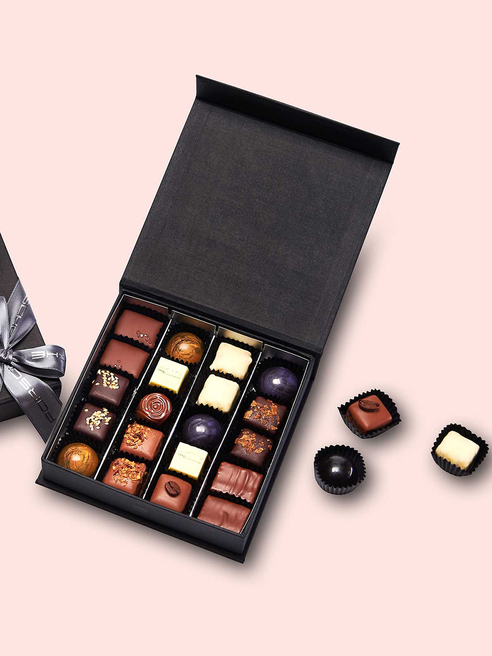 Personalised truffle packaging boxes with inserts made from premium cardboard for secure storage and elegant presentation