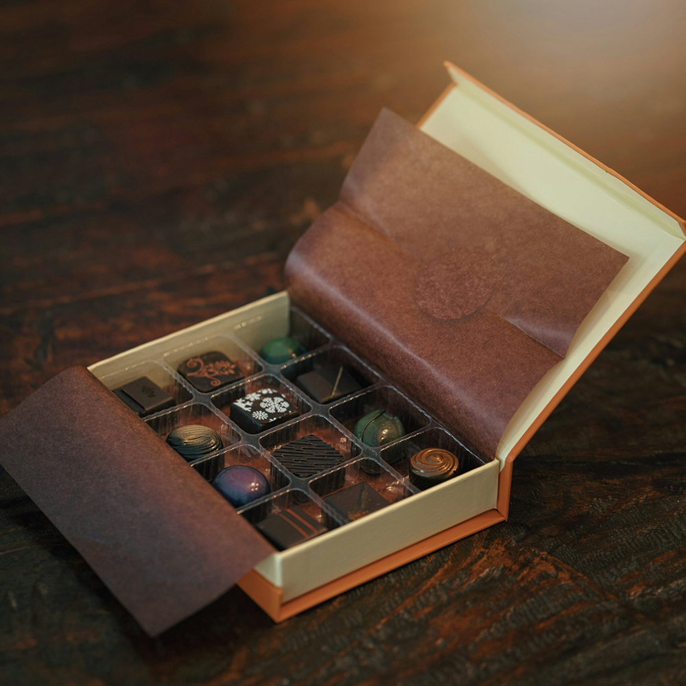 Luxury custom truffle boxes for handmade and gourmet chocolates featuring bespoke sizes, rigid construction and premium finishes