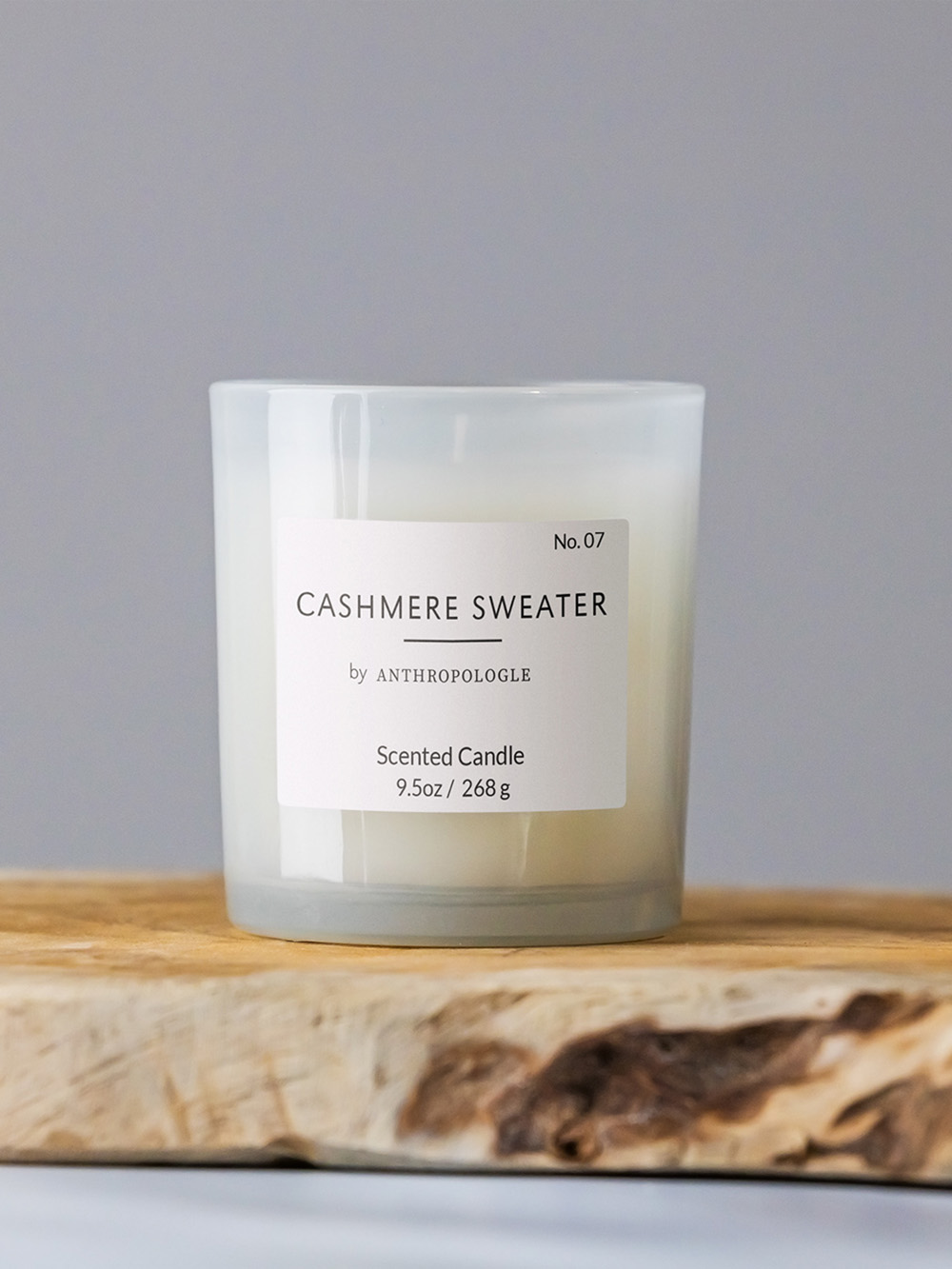 Custom candle labels UK wholesale with bespoke printed logo and fragrance names for jar candles