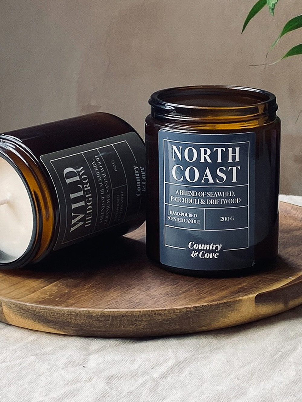 Custom candle labels UK wholesale with bespoke printed logo and fragrance names for jar candles