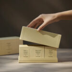 Bespoke rigid candle boxes with embossed branding for upscale retail and corporate gifting