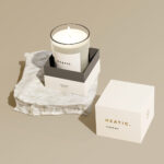 Bespoke rigid candle boxes with embossed branding for upscale retail and corporate gifting