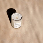 Printed candle dust covers for glass jar candles with fragrance name and safety instructions