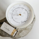 Printed candle dust covers for glass jar candles with fragrance name and safety instructions