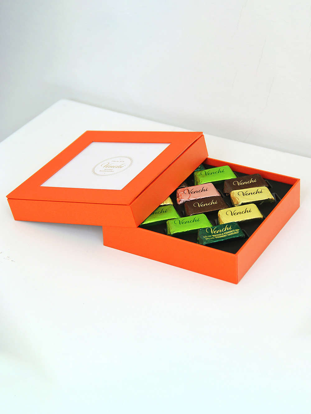 Cardboard insert rigid box for secure and stylish packaging