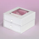 Luxury rigid box with window cutout for retail display